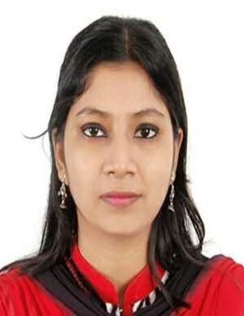 a woman with dark hair wearing a red shirt